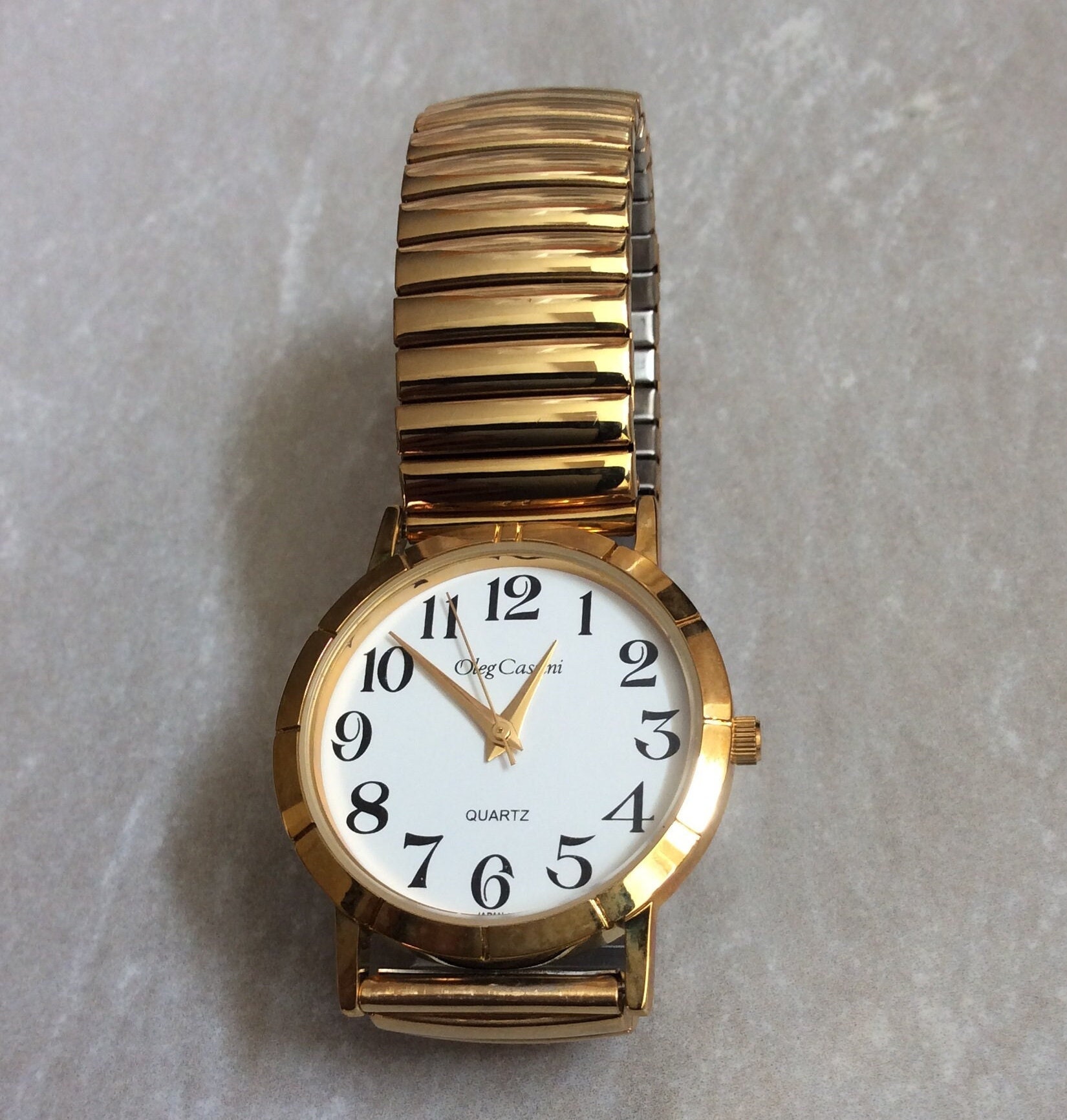 Gold stretch band watch sale