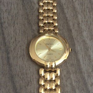 Vintage Rare Men's Oleg Cassini Gold Watch Round Gold Dial on Gold Linked Band In Vintage Mint Condition!