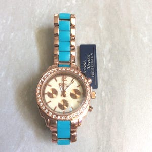 Reloj vintage sin usar para mujer Donna Vivian con cristales azules y dorados rosas, esfera redonda con perlas, ¡belleza!