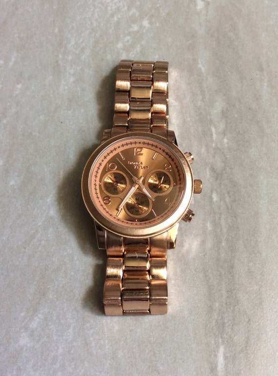 Rose gold dial women's watch hotsell