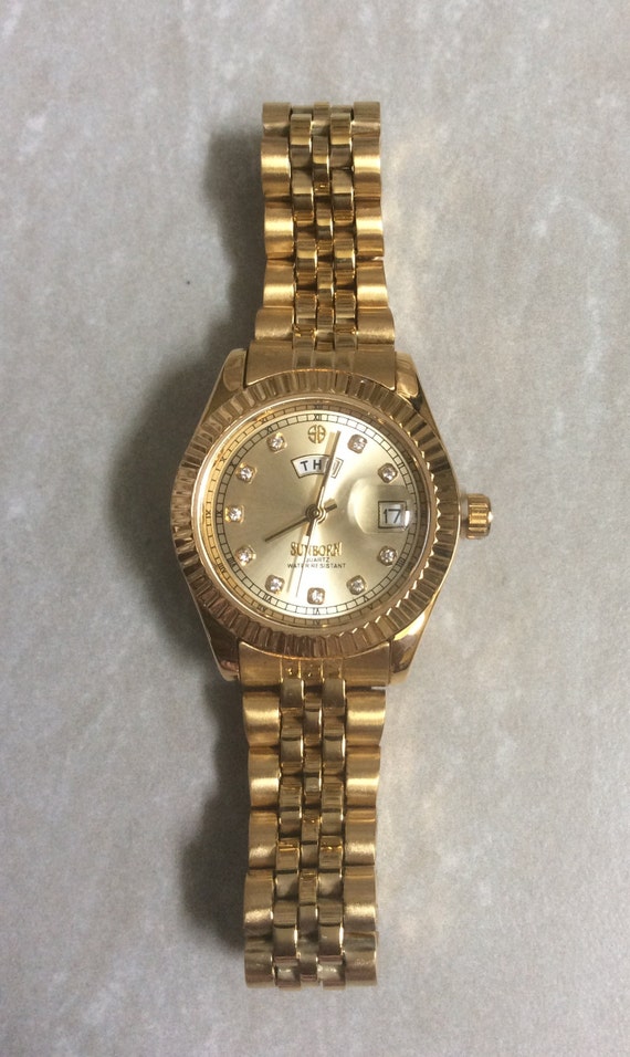 SUNBORN Women s Gold Watch Round Gold Dial Day Date Gold Dial Crystal Hours on a Gold Linked Band Unused New Vintage Watch Beautiful