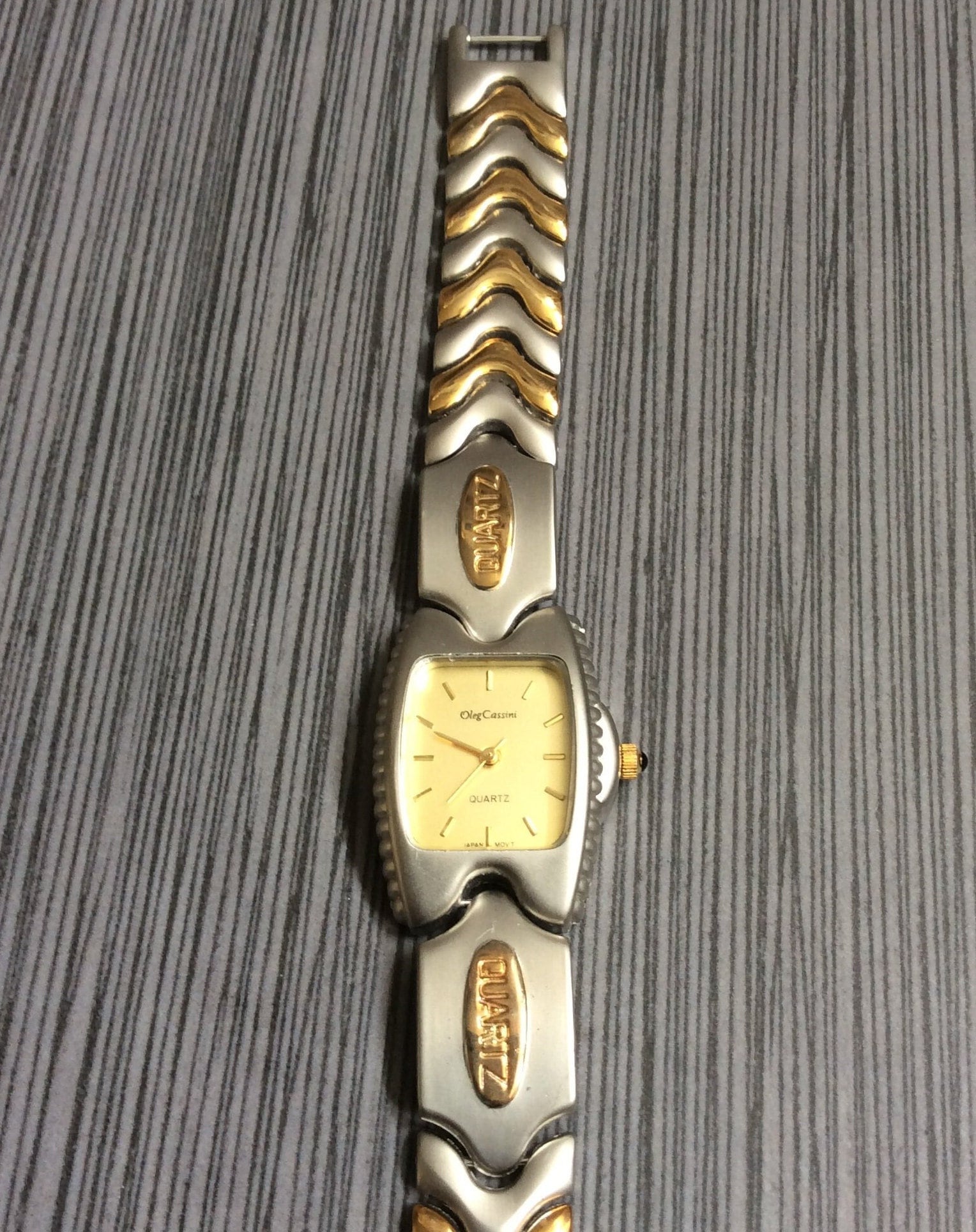 Oleg cassini watch price clearance