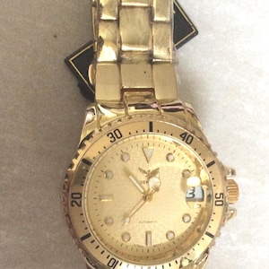 Geneva Women&#39;s Automatic Watch Gold Date Dial on Gold Linked New Unused Vintage item Beauty!