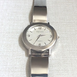 Oleg Cassini Watch Round Silver Dial Easy to Read on a Silver Mesh Style Band Mint Vintage Watch Rare Find!