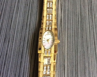 Buy Elgin Women s Gold Crystal Watch Having a Oval Pearl Dial
