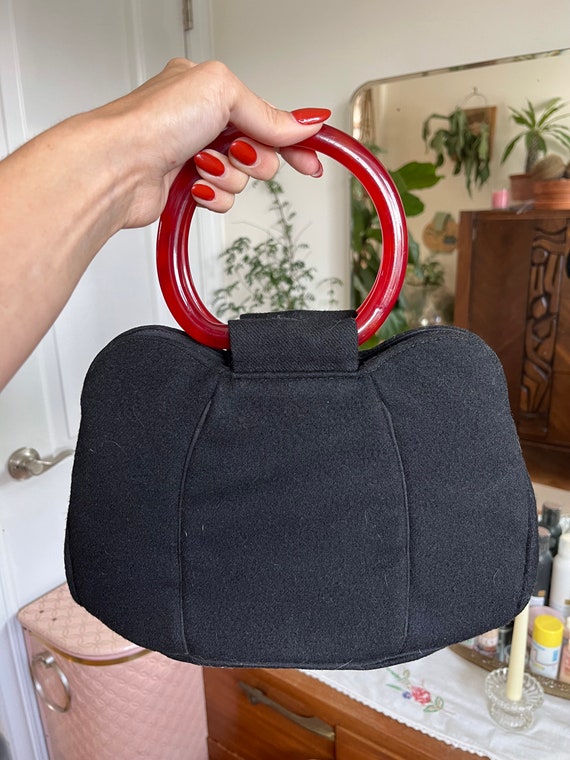 Vintage Black purse with Bakelite Handles.