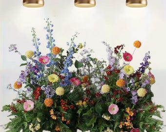 May include: A floral backdrop with a variety of colorful flowers, including pink, yellow, blue, and orange. The flowers are arranged in a lush, cascading design, creating a beautiful and vibrant display. The backdrop is perfect for a wedding, party, or other special event.