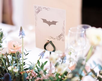 Grey Superhero Logo Table Numbers/Names