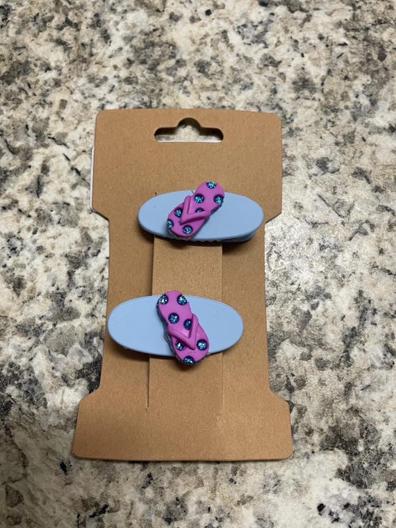 hair clips with cute beads on them