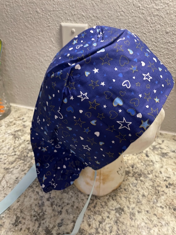 scrub hat with ponytail ties