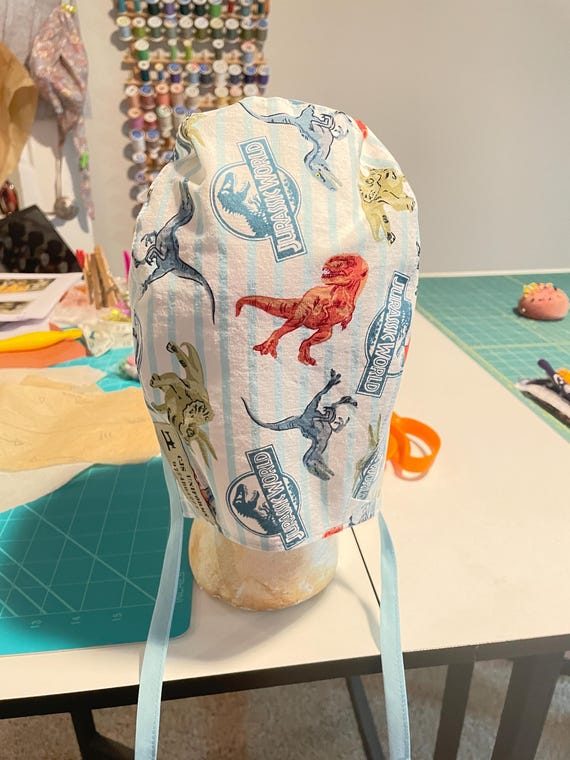 Jurassic world tie back scrub hat