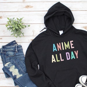 May include: Black hoodie with a white pocket and the text "Anime All Day" in rainbow colors.