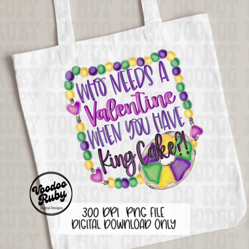 May include: A white tote bag featuring a graphic design with purple, green, and yellow Mardi Gras beads forming a rectangular frame. The text reads "WHO NEEDS A VALENTINE WHEN YOU HAVE KING CAKE?!" next to a colorful ring-shaped king cake.