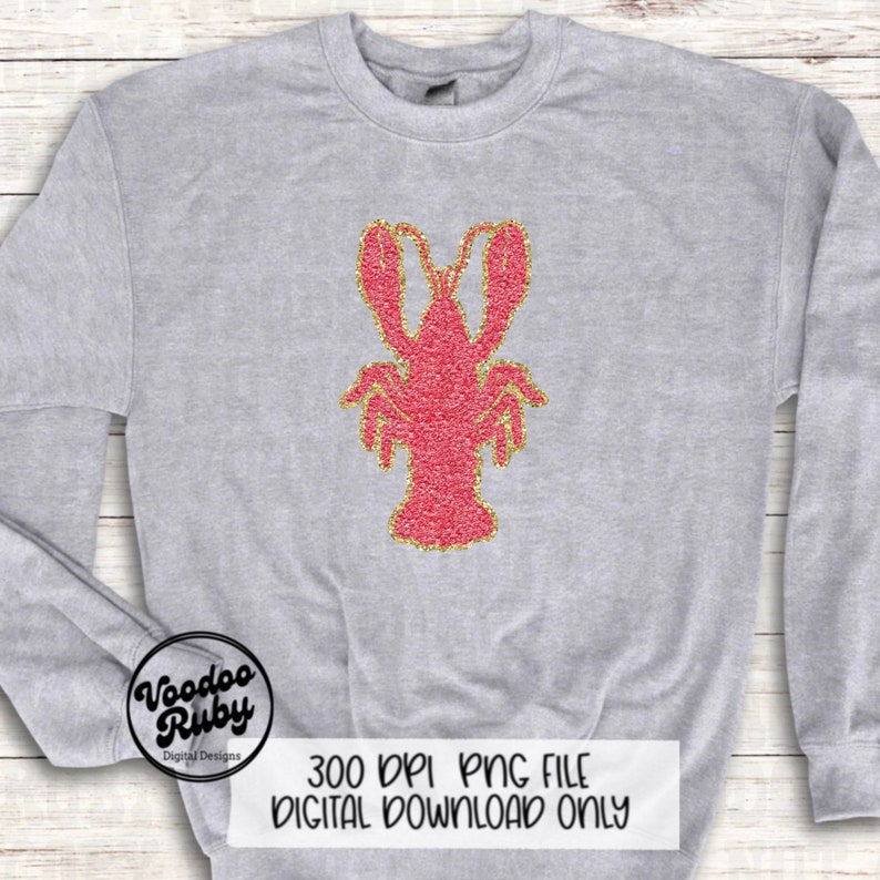 May include: A gray sweatshirt with a pink glitter lobster design. The text "Voodoo Ruby Digital Designs" and "300 DPI PNG FILE DIGITAL DOWNLOAD ONLY" is printed on the sweatshirt.
