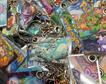 Recycled P0KE M0N card keychains