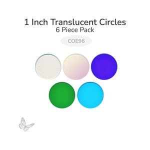 May include: Six 1-inch translucent circles in a pack. The circles are in various colors: clear, light pink, blue, green, and light blue. The text on the image reads "1 Inch Translucent Circles 6 Piece Pack" and "COE96". A small butterfly graphic is in the lower left corner.