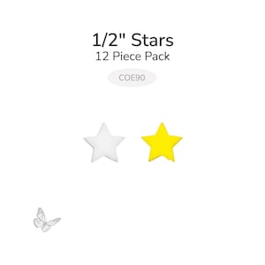 May include: Two star-shaped craft embellishments. One is white, the other is yellow. The text "1/2" Stars 12 Piece Pack" is above the stars. A small butterfly graphic is in the lower left corner.
