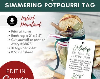 May include: A rectangular white tag for simmering potpourri featuring the text Holiday SIMMERING POTPOURRI with instructions and a botanical illustration of orange slices and pinecones. The tag measures 2 inches by 3.5 inches.