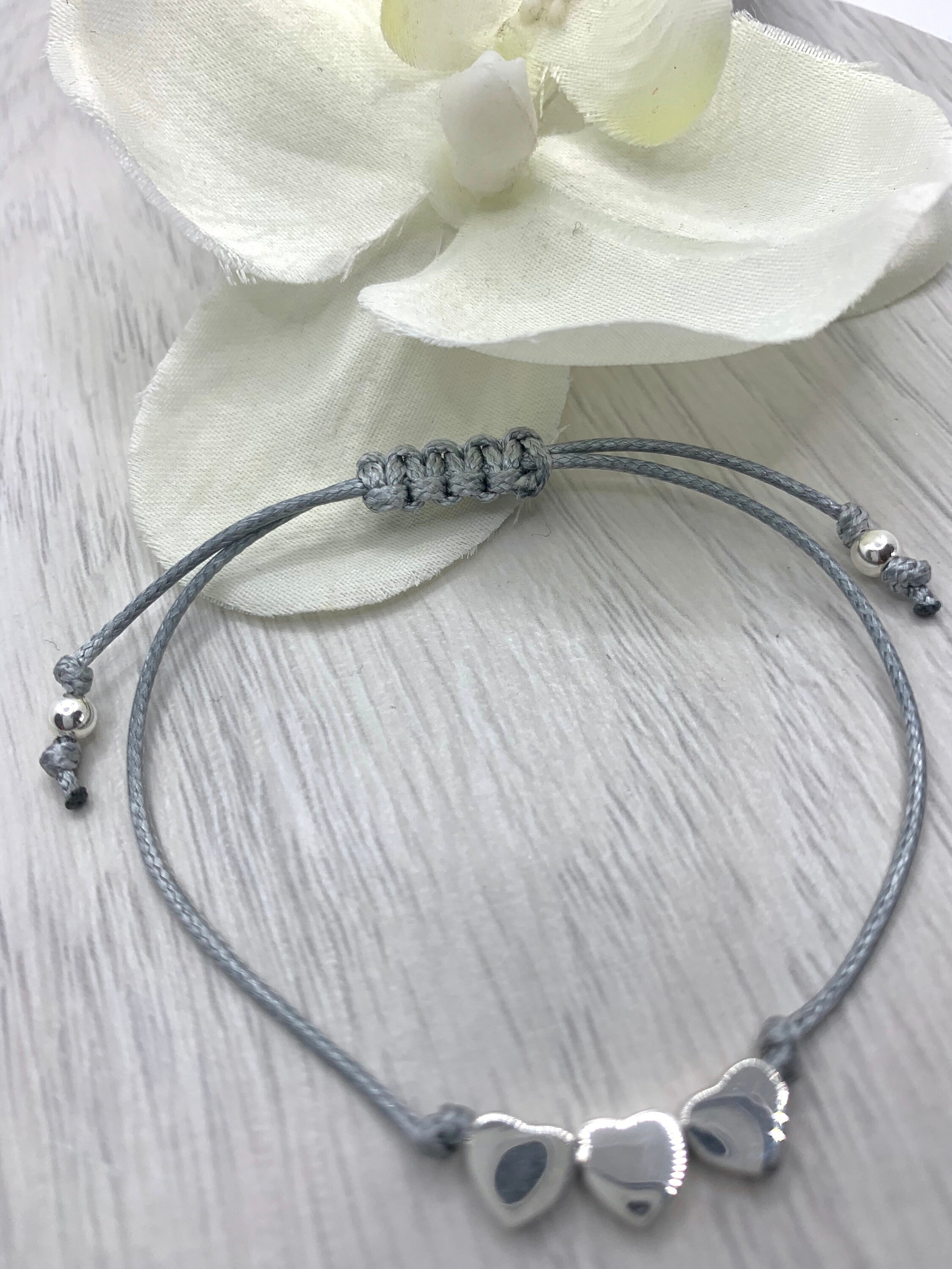 Friendship bracelet with sterling silver hearts Etsy
