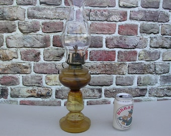 Antique oil lamp made of blown glass