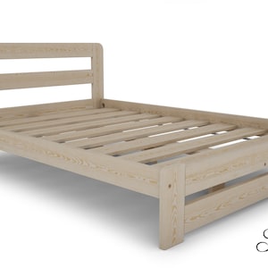May include: A wooden bed frame with a slatted headboard and footboard. The frame is made of natural wood and has a light brown finish.