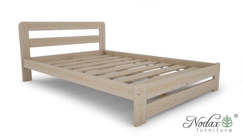 May include: A wooden bed frame with a slatted headboard and footboard. The frame is made of natural wood and has a light brown finish.