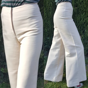 1970s deadstock cream colour massive flare pants. Bell bottoms. 24&quot; waist.