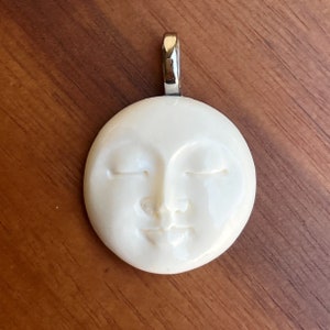 Moon face pendant
