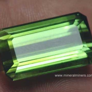 Flawless Large Green Tourmaline Gemstone - photo was taken inside under fluorescent lights.