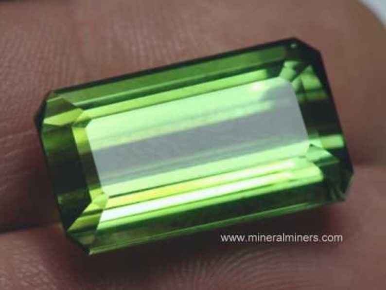 Flawless Large Green Tourmaline Gemstone - photo was taken inside under fluorescent lights.