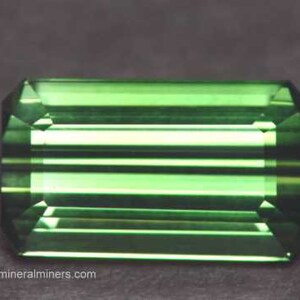 Flawless Large Green Tourmaline Gemstone - photo was taken inside under fluorescent lights.