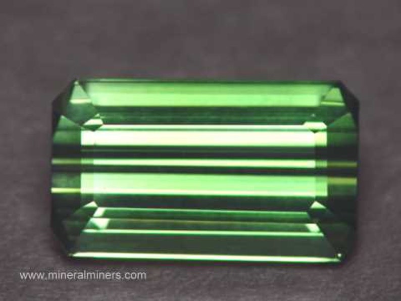 Flawless Large Green Tourmaline Gemstone - photo was taken inside under fluorescent lights.