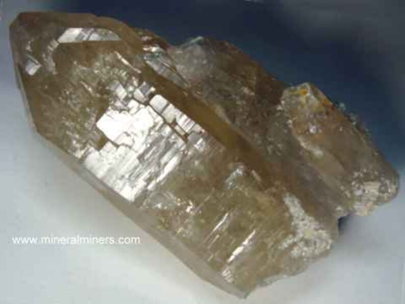 Natural Color Citrine Rough - photo was taken inside under fluorescent lights.