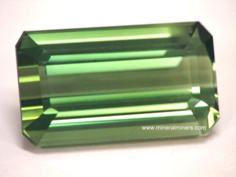 Flawless Large Green Tourmaline Gemstone - photo was taken inside under fluorescent lights.