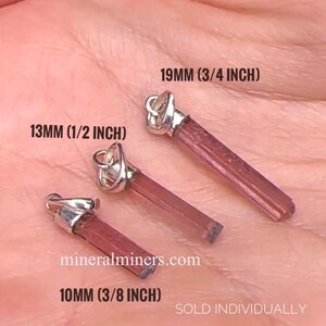 May include: Three pink tourmaline crystal pendants with silver bails. The pendants are 10mm (3/8 inch), 13mm (1/2 inch), and 19mm (3/4 inch) in length. The text "mineralminers.com" and "SOLD INDIVIDUALLY" is visible in the image.