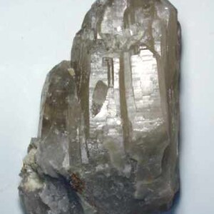 Back view of Natural Color Citrine Rough - photo was taken inside under fluorescent lights.