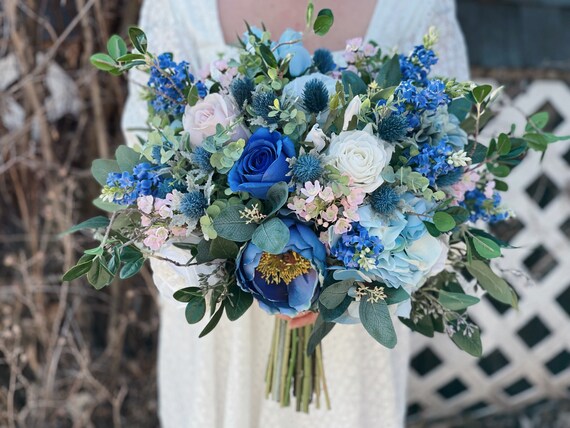 Peacock Blue & White Funeral Wreath Flowers