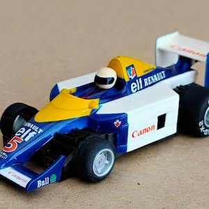 Slot Car, HO (1/64) scale Vintage TYCO Slot Car Renault elf Canon F1 number 5 New Old Stock body on New Old Stock 440 MX2 chassis
