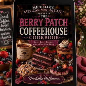 May include: A digital tablet displaying the cover of Michelle's Mexican Mocha Café Presents The Berry Patch Coffeehouse Cookbook by Michelle Hoffmann. The cover features a chocolate cake, a berry pastry, and a chocolate berry dessert.