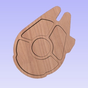 May include: A wooden serving tray in the shape of a spaceship, featuring a central circular area and several surrounding compartments. The tray is made of light-colored wood and has a smooth finish. The design is reminiscent of a popular science fiction franchise.