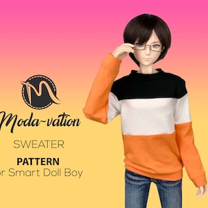 May include: A pattern for a sweater for a doll. The sweater is black, white, and orange. The doll is wearing glasses and has black hair.