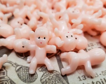 little plastic baby dolls
