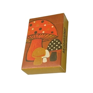 May include: A set of three ceramic nesting bowls in shades of blue, green, and white. The bowls feature a speckled glaze and a simple, modern design. The largest bowl measures approximately 6 inches in diameter.