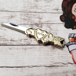 Mini Knife Love Hearts Arrow Charm Shiny Brass Tiny Retro Sweetheart Folding Knife Shiny Cupid Valentine Miniature Novelty Knife Charm
