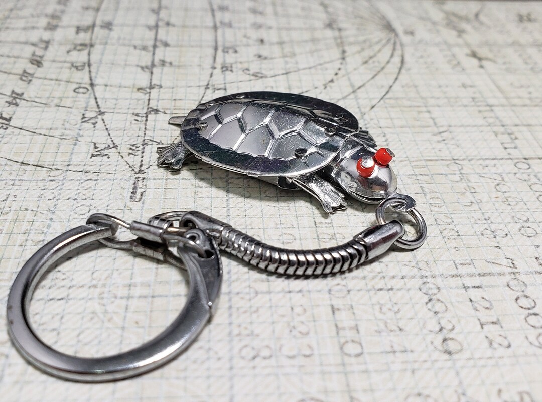 Coach turtle shop keychain
