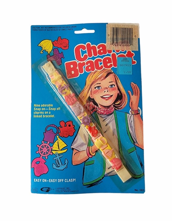 Vintage plastic charm bracelet Gem