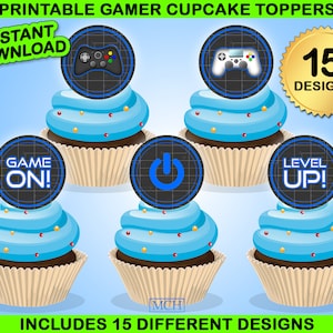 May include: Printable cupcake toppers featuring a gamer theme. The toppers include images of game controllers, the words "Game On!" and "Level Up!" and a power button symbol. There are 15 different designs in total.