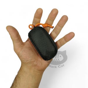 EDC Pouch, key organizer, wallet organizer for a multitool, flashlight, and folding knife.