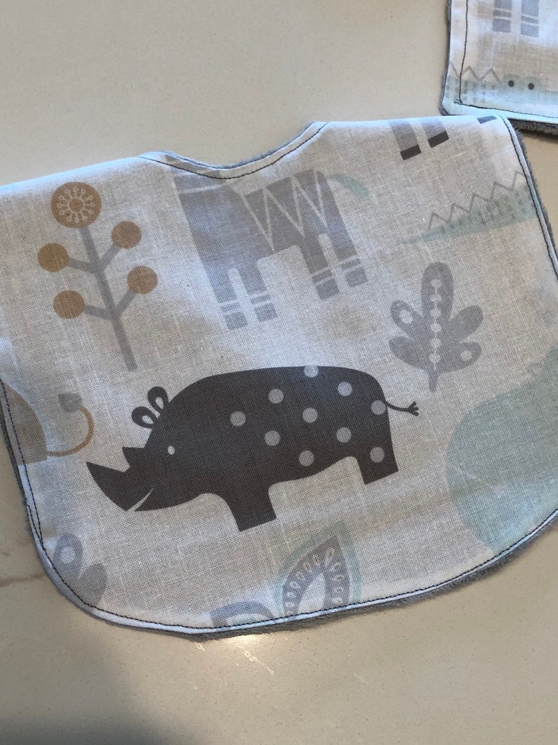 1 pacifer clip 1 toy clip set with gray minky Zoo friends Taggy blankie newborn bib with minky backing pair of car seat strap covers