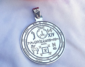 May include: Silver pendant with a circular design featuring a symbol with the number 14 and the text "HAAJAH RHUEL". The pendant also includes the text "MEAE REQUIRANT + CLAMAVI ENIM IN TOTO DEUS CORDE ADJUVAT ME, EXAUDI ME: ET DOMINE DOMINUS EST JUSTIFICATIONES SUSCEPTOR ANIMAE TUAS".